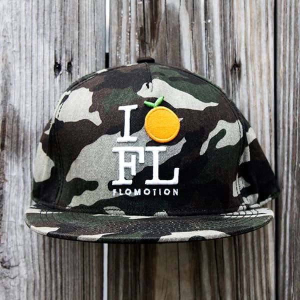 Trucker hat with signature "orange" logo; Photography by Jackson Berger