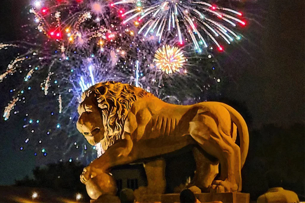 Lion statue and fireworks in St. Augustine during July 4th.