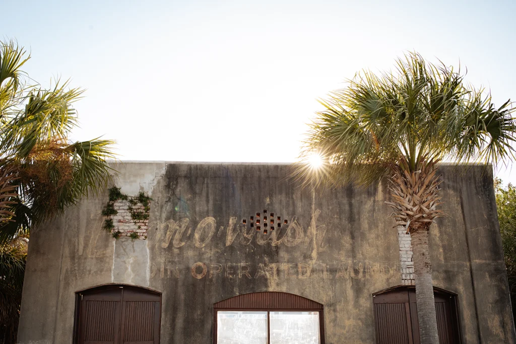 The sun peaks over Apalachicola building. Part of Florida's Forgotten Coast.