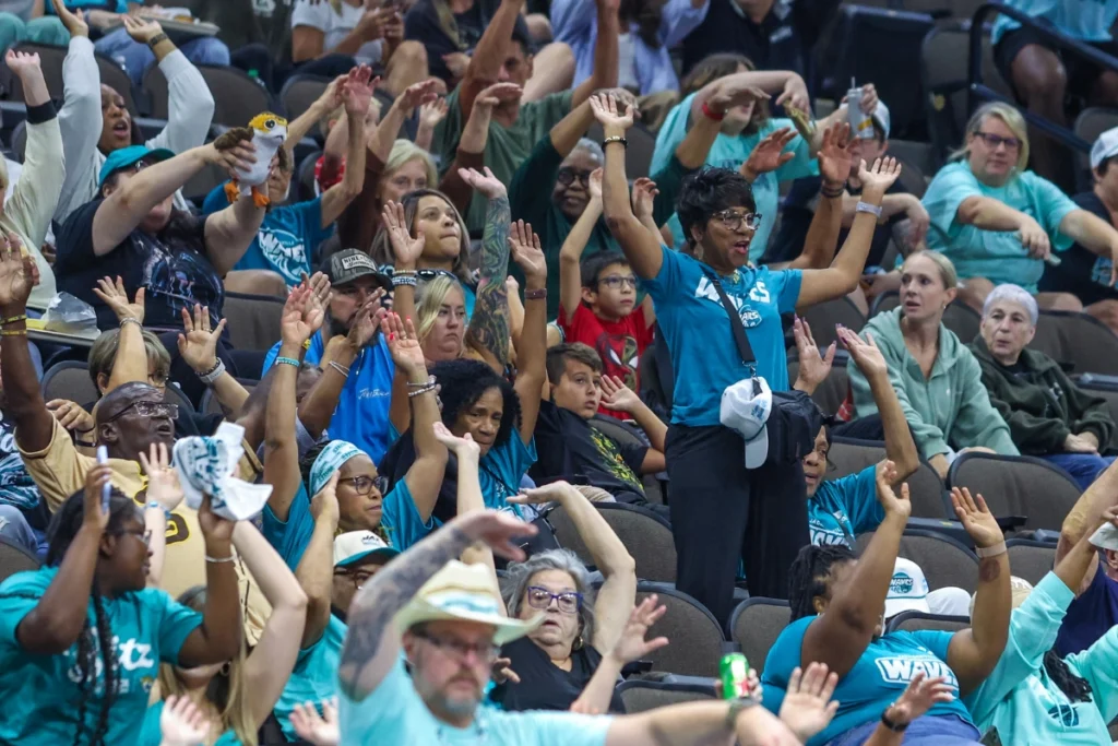 Professional Florida Women's Basketball is Back 3 fans cheering