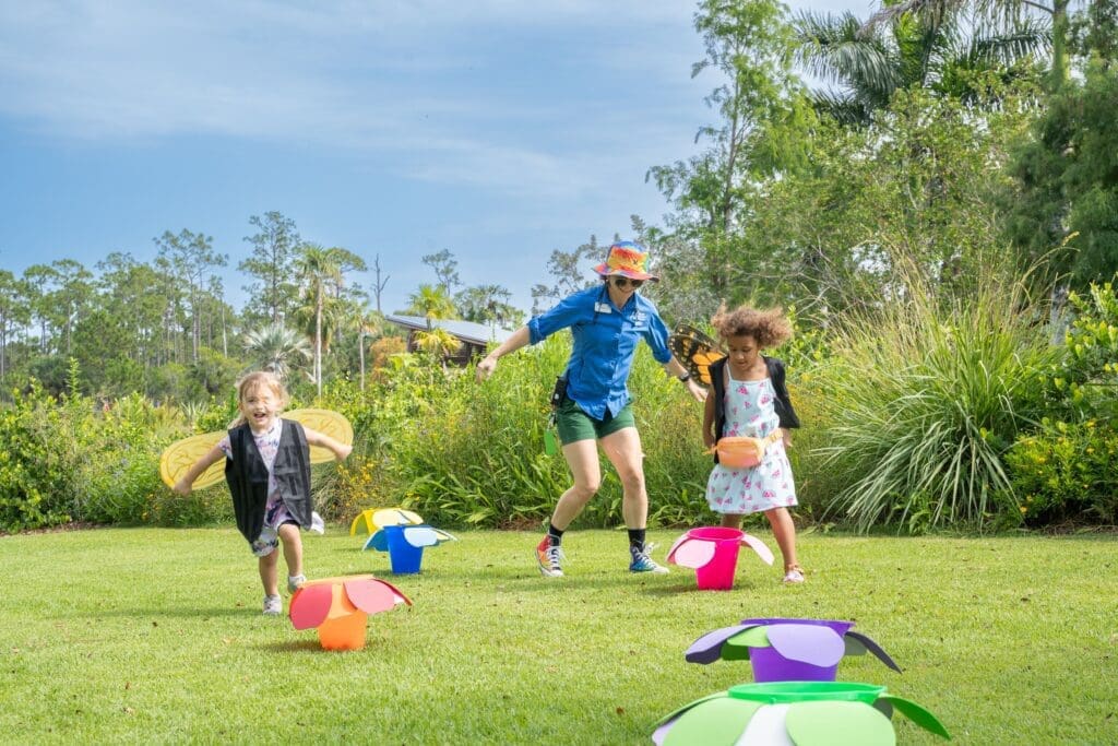 Naples Botanical Garden Celebrates Environmental Artistry 1 Joyful children run around at the sunny Naples Botanical Garden.