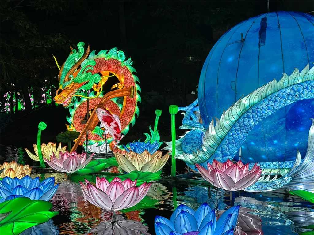 12 Places to See Holiday Lights in Florida 5 A dragon and lotus flower lighting display.